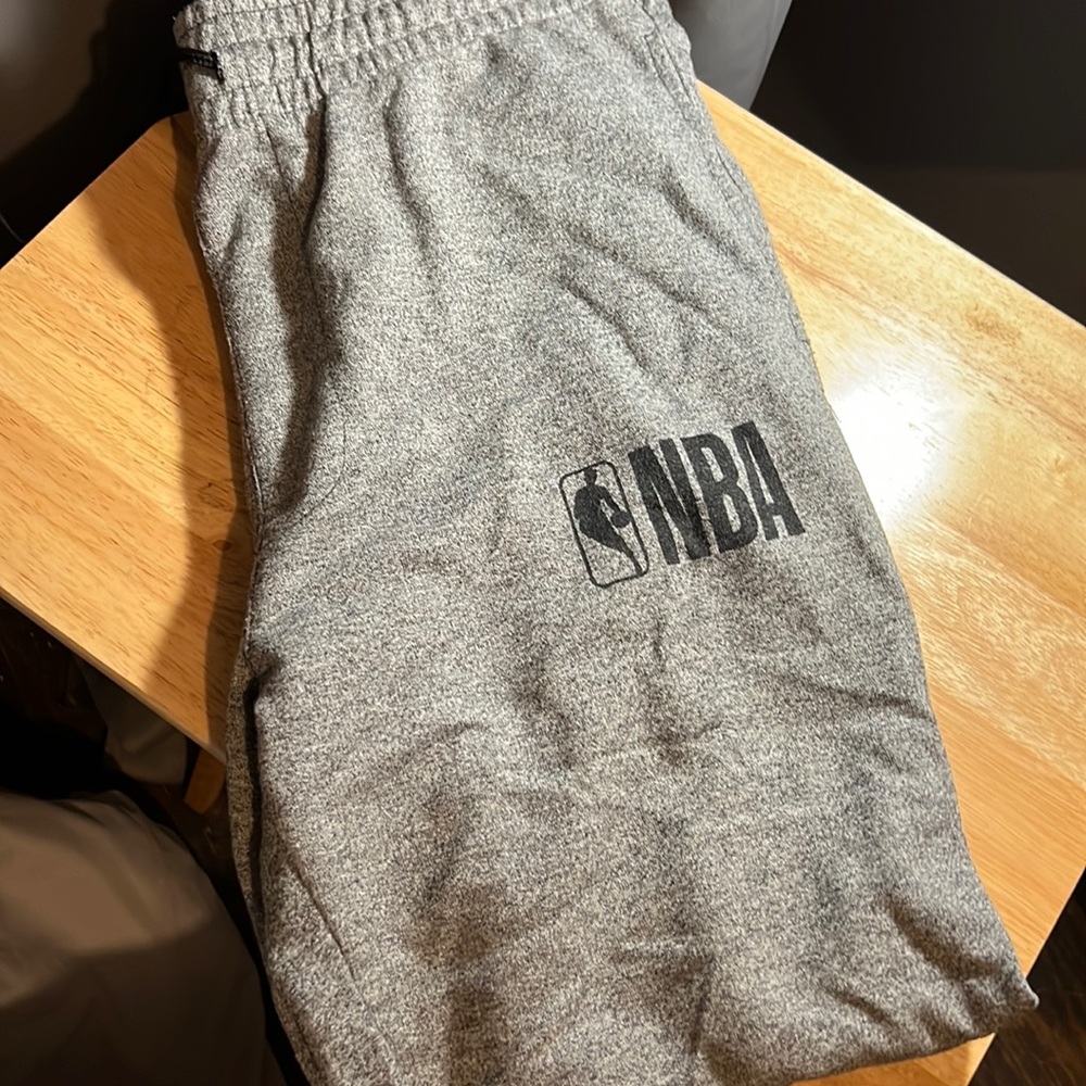 Gray and black NBA joggers size medium, worn a few times.